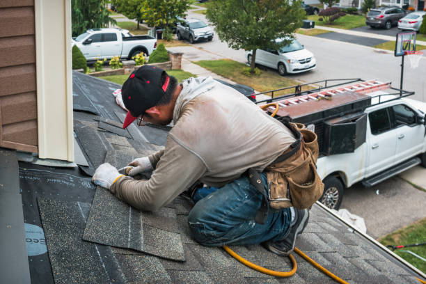 Professional Roof Replacement technician working in Bippus, IN